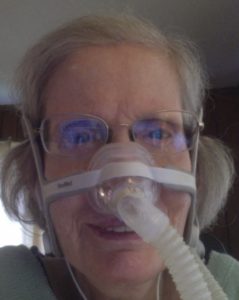 Diane Coleman with breathing mask